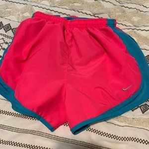 Neon Nike shorts